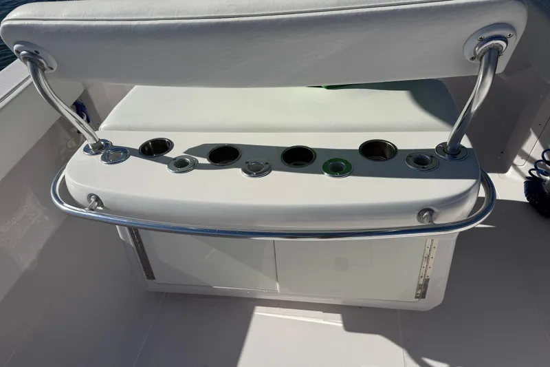Slide: The Image of 2009 Venture 39 Open boat seating with rod holders and stainless steel railing. - 12