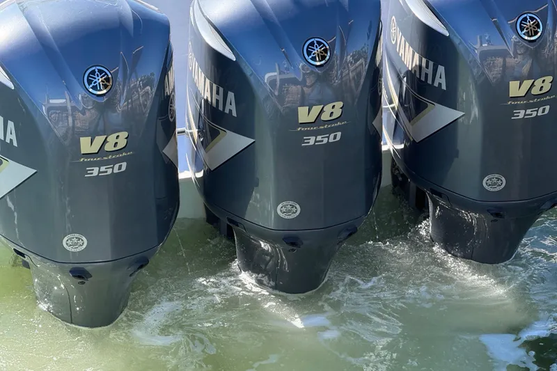 Slide: The Image of Triple Yamaha V8 350 outboard engines on a 2009 Venture 39 Open boat. - 5