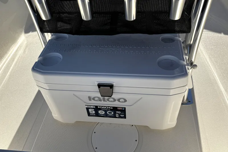 Slide: The Image of Bulls Bay 2000 boat with Igloo cooler, 2026 model, featuring rod holders and storage. - 9