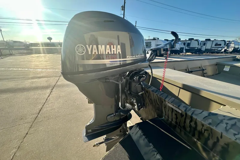 Slide: The Image of 2026 SeaArk 1652 Special boat with Yamaha outboard motor in sunlight. - 8