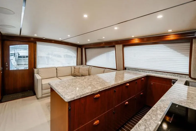 Slide: The Image of Luxurious interior of 2021 Viking 58 Convertible yacht with elegant wood and marble finishes. - 119