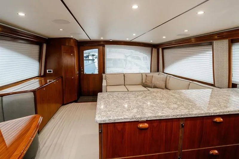 Slide: The Image of Luxurious interior of 2021 Viking 58 Convertible yacht with elegant wood and marble finishes. - 121