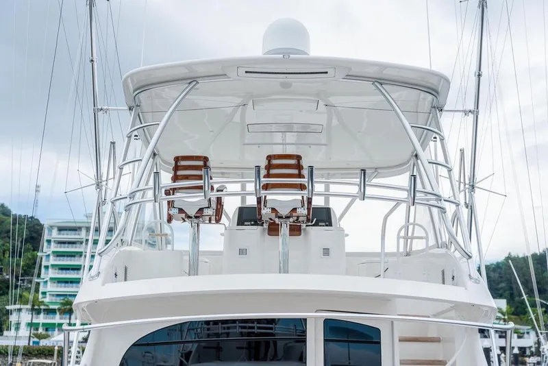 Slide: The Image of 2021 Viking 58 Convertible yacht with sleek design and modern flybridge. - 40