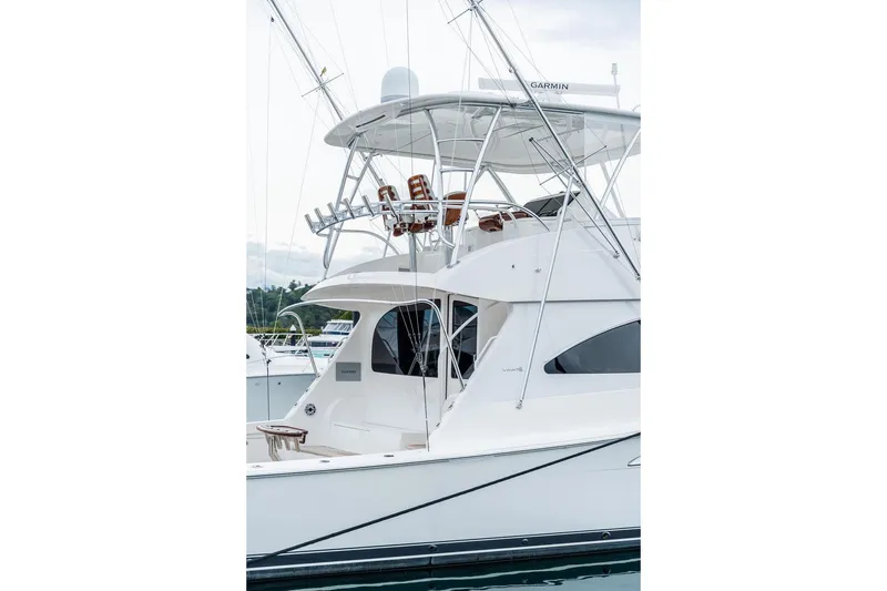 Slide: The Image of 2021 Viking 58 Convertible yacht with sleek design and modern features. - 43