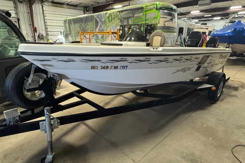 Slide: The Image of 2000 Yar-Craft 1785 Mille Lacs boat on trailer in indoor storage facility. - 1