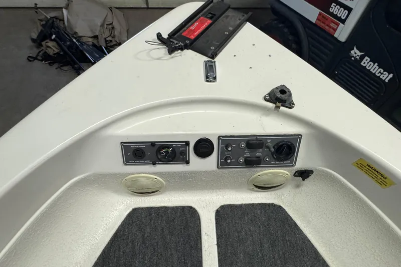 Slide: The Image of Control panel of a 2000 Yar-Craft 1785 Mille Lacs boat with speakers and switches. - 13