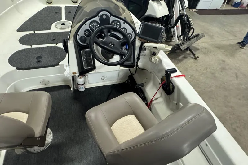 Slide: The Image of 2000 Yar-Craft 1785 Mille Lacs boat interior with steering console and seating. - 6