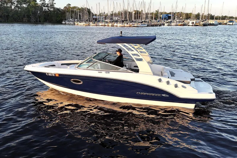 Slide: The Image of 2017 Chaparral 246 SSi boat on calm water. - 2