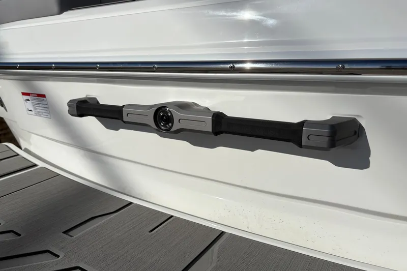 Slide: The Image of 2026 Supra SL 450 boat detail with sleek handle and modern design elements. - 10