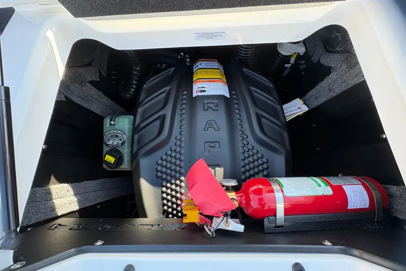 Slide: The Image of Engine compartment of 2026 Supra SL 450 with fire extinguisher and safety equipment. - 17