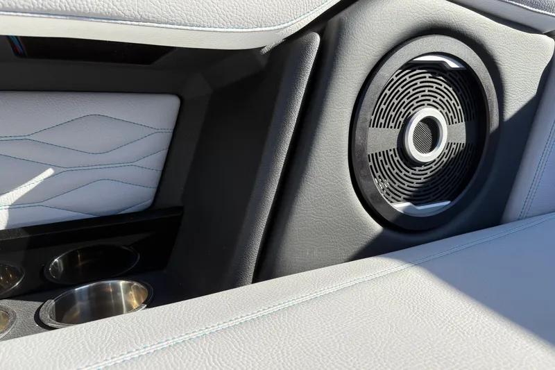 Slide: The Image of 2026 Supra SL 450 interior with sleek speaker design and luxurious leather finish. - 23