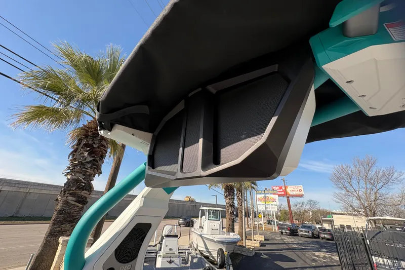 Slide: The Image of 2026 Supra SL 450 boat with advanced speaker system, palm trees, and clear sky background. - 48