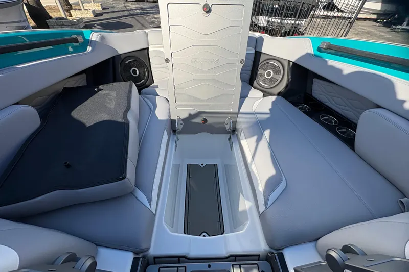 Slide: The Image of 2026 Supra SL 450 boat interior with seating and storage compartment. - 57