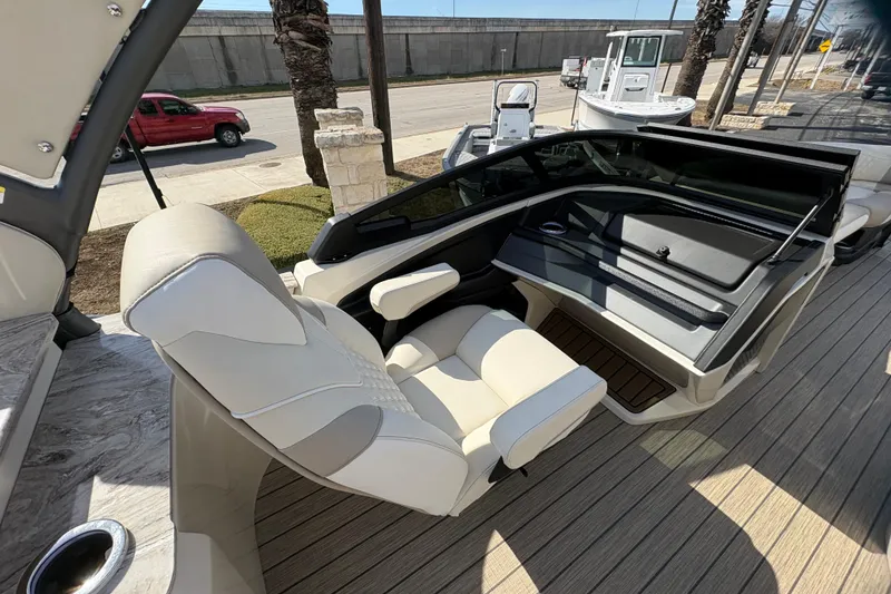 Slide: The Image of Luxurious interior of 2026 Avalon Exalibur LTD 27 Elite Winshield boat with plush seating. - 18
