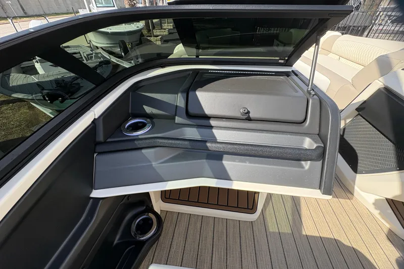 Slide: The Image of 2026 Avalon Exalibur LTD 27 Elite interior with open windshield and seating area. - 19