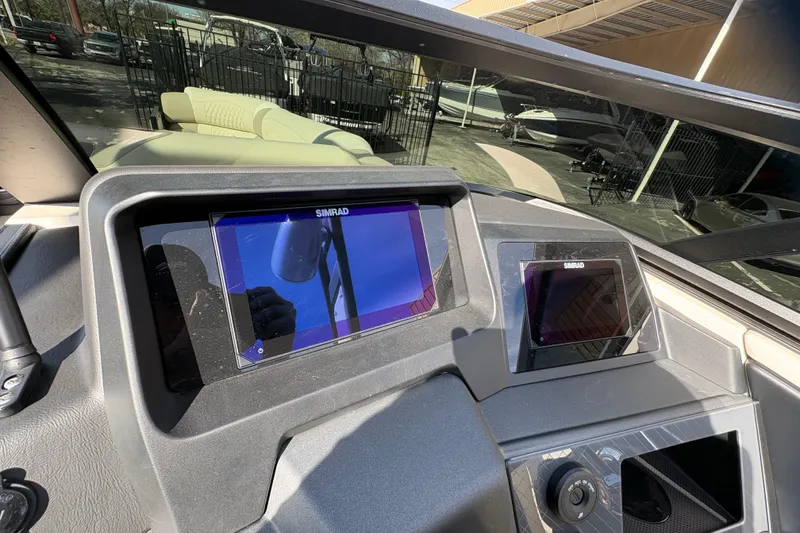 Slide: The Image of Dashboard of 2026 Avalon Exalibur LTD 27 Elite with Simrad displays. - 22