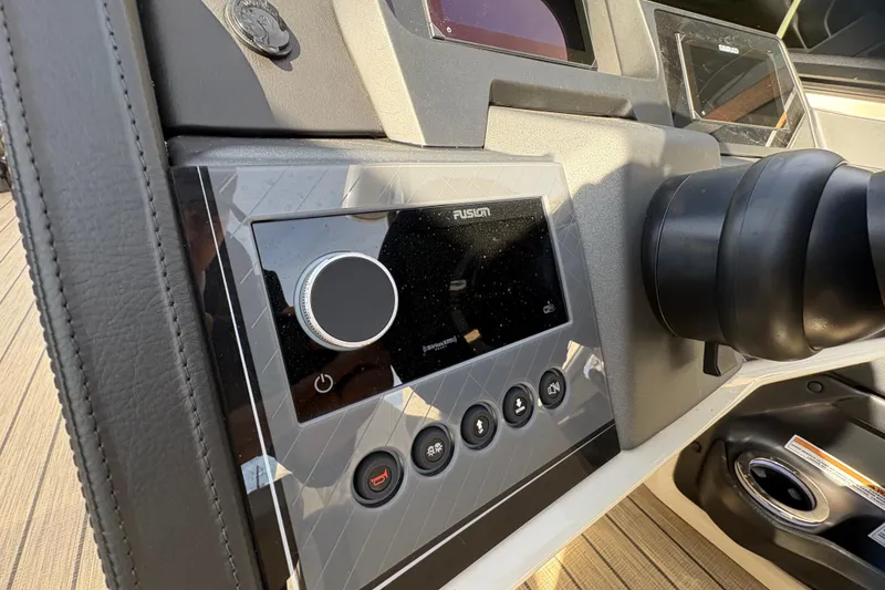 Slide: The Image of Control panel of 2026 Avalon Exalibur LTD 27 Elite Winshield boat, featuring modern dashboard design. - 23