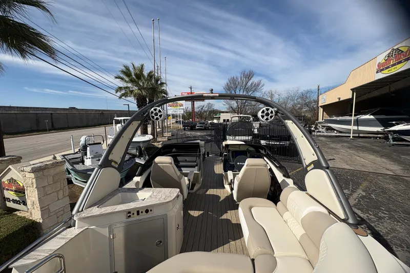 Slide: The Image of 2026 Avalon Exalibur LTD 27 Elite Windshield boat with luxurious seating and modern design. - 48