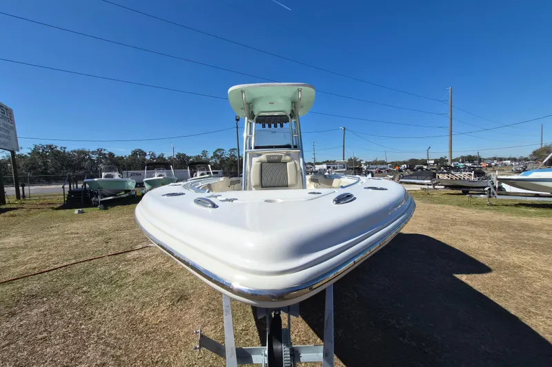 Slide: The Image of 2026 Key West 239 FS boat displayed outdoors on a sunny day. - 14