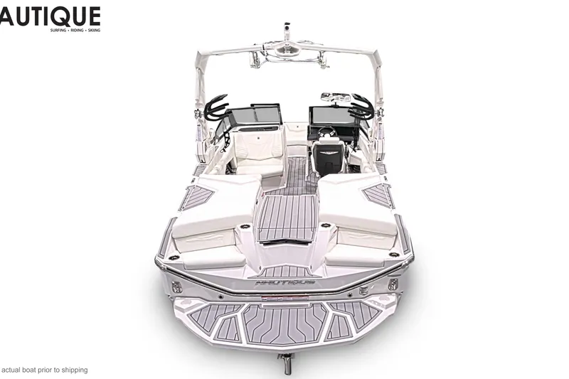 Slide: The Image of 2026 Nautique Super Air Nautique G21 boat, sleek design, white interior, advanced controls. - 3