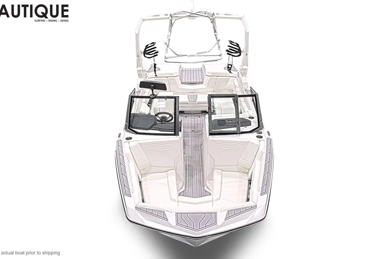 Slide: The Image of 2026 Nautique Super Air Nautique G21 boat, top view, sleek design, white interior. - 6