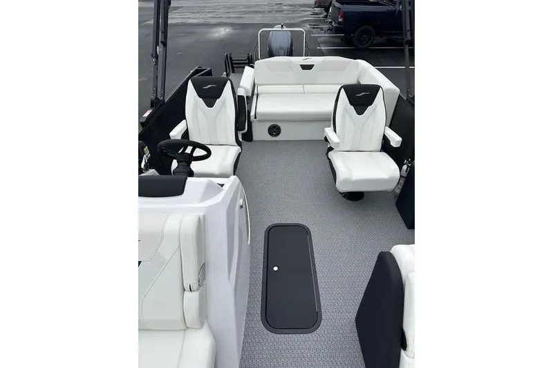Slide: The Image of Interior of 2026 EVOTTTI 523CS boat with white seating and modern design. - 13