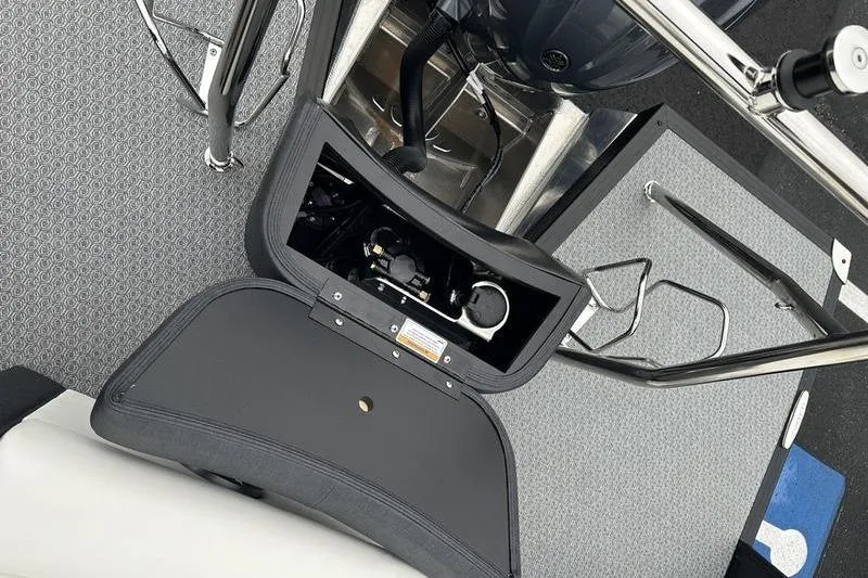 Slide: The Image of Interior view of 2026 EVOTTTI 523CS boat, showcasing engine compartment and seating area. - 16