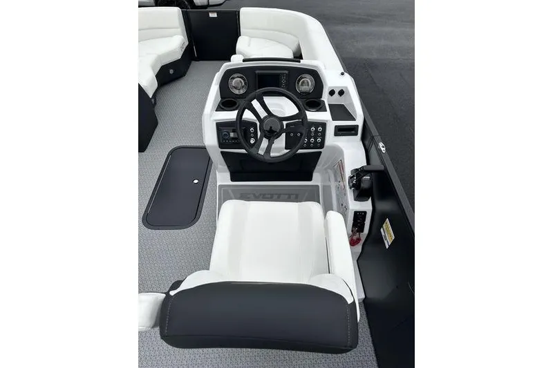 Slide: The Image of Cockpit of 2026 EVOTTTI 523CS boat with modern steering and seating. - 28