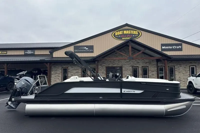 Slide: The Image of 2026 EVOTTI 523CS pontoon boat displayed at Boat Masters Marine dealership. - 3