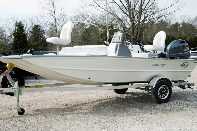 The Image of 2026 G3 Bay 17 boat on trailer, featuring Yamaha outboard motor, parked outdoors. - 0