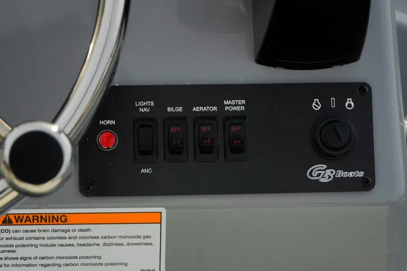 Slide: The Image of Control panel of 2026 G3 Bay 17 boat with switches and warning label. - 9