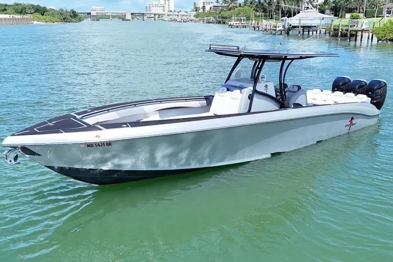 The Image of 2016 Statement 380 Open boat on calm water, featuring sleek design and powerful engines. - 1