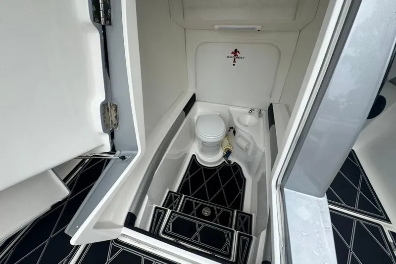 Slide: The Image of 2016 Statement 380 Open boat interior with compact bathroom and modern design. - 17