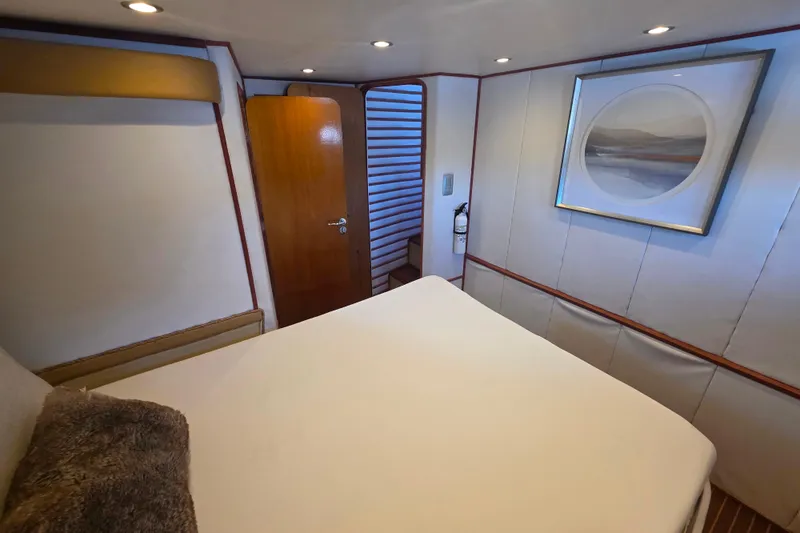 Slide: The Image of Cozy bedroom in 1990 Novatec 44 Aft Cockpit Motor Yacht with modern decor. - 26