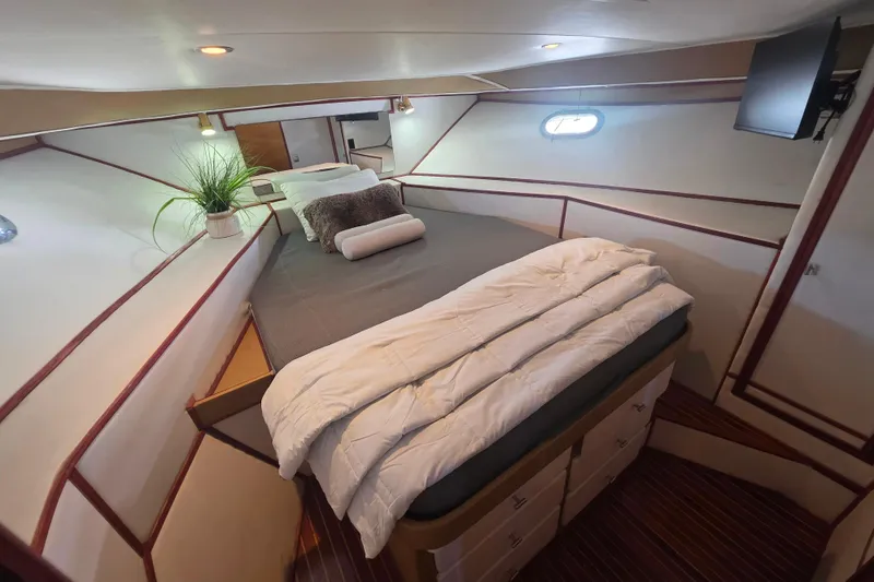 Slide: The Image of Cozy bedroom in 1990 Novatec 44 Aft Cockpit Motor Yacht with modern decor. - 33