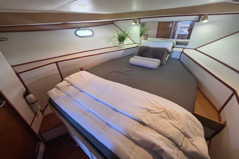 Slide: The Image of Cozy bedroom in 1990 Novatec 44 Aft Cockpit Motor Yacht with modern decor. - 34