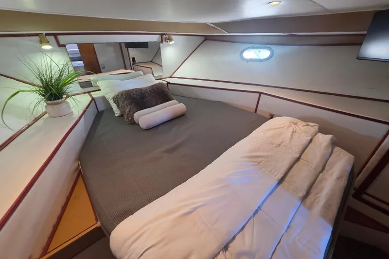Slide: The Image of Cozy bedroom in 1990 Novatec 44 Aft Cockpit Motor Yacht with modern decor. - 35