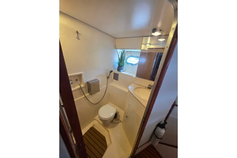 Slide: The Image of Bathroom interior of 1990 Novatec 44 Aft Cockpit Motor Yacht with shower and sink. - 39