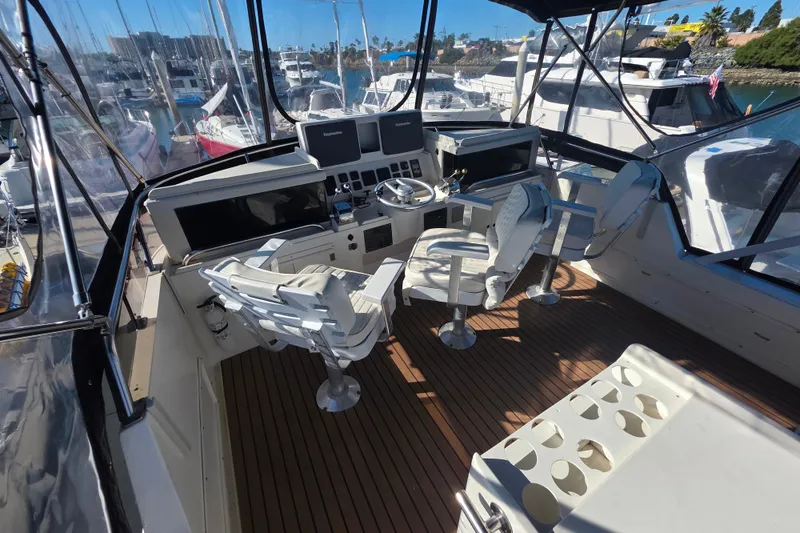 Slide: The Image of Cockpit of 1990 Novatec 44 Aft Cockpit Motor Yacht with helm and seating. - 45