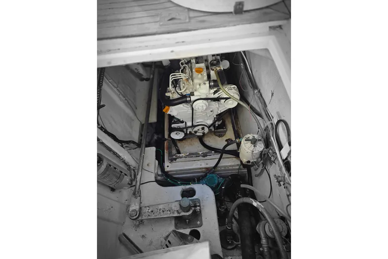 Slide: The Image of Engine compartment of 1990 Novatec 44 Aft Cockpit Motor Yacht, showcasing mechanical components. - 57