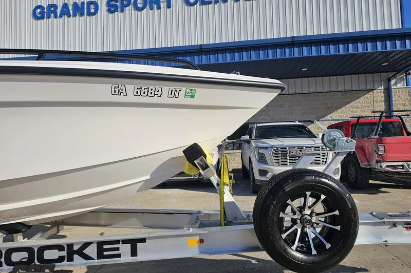 Slide: The Image of 2025 Concept 27' CC boat on trailer at Grand Sport Center. - 11