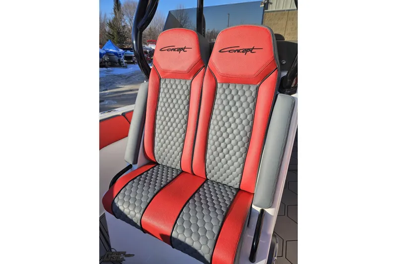 Slide: The Image of Red and gray seats in 2025 Concept 27' CC boat, featuring hexagonal pattern design. - 110