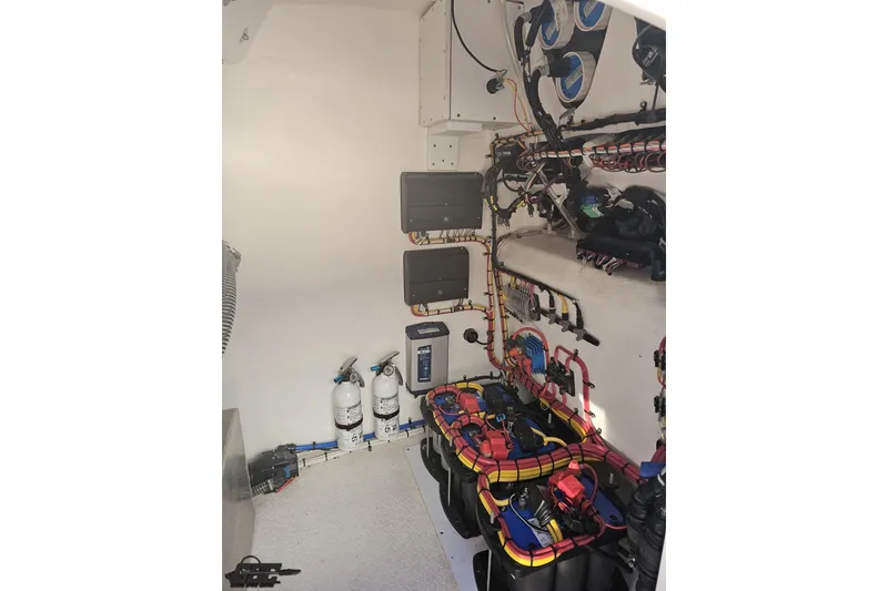 Slide: The Image of Interior view of 2025 Concept 27' CC boat's electrical and mechanical systems. - 113