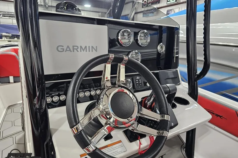 Slide: The Image of Steering console of 2025 Concept 27' CC boat with Garmin navigation system. - 116