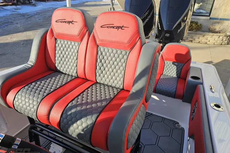 Slide: The Image of Red and gray seating on 2025 Concept 27' CC boat with dual Mercury engines. - 118
