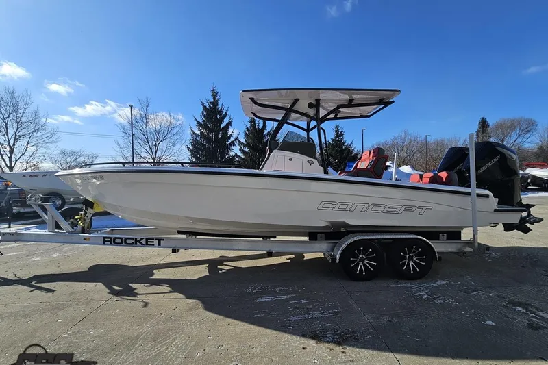 Slide: The Image of 2025 Concept 27' CC boat on trailer under clear blue sky. - 18