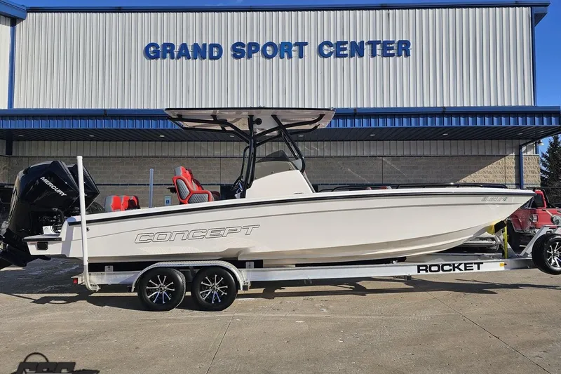 Slide: The Image of 2025 Concept 27' CC boat on trailer at Grand Sport Center. - 2