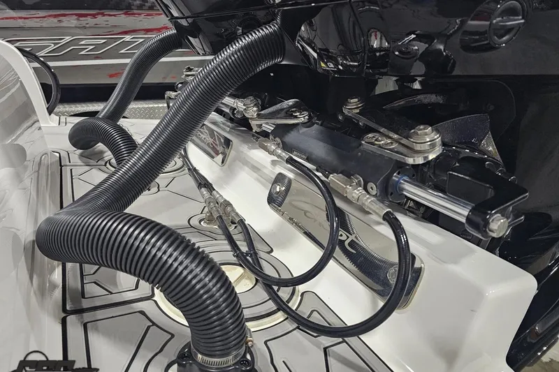 Slide: The Image of Close-up of 2025 Concept 27' CC boat engine components and wiring. - 31