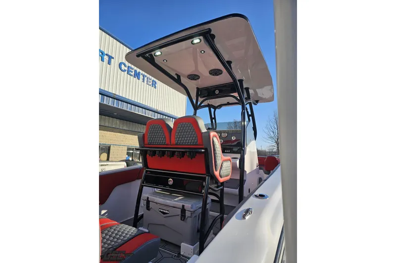 Slide: The Image of 2025 Concept 27' CC boat interior with red and gray seating, modern design. - 43