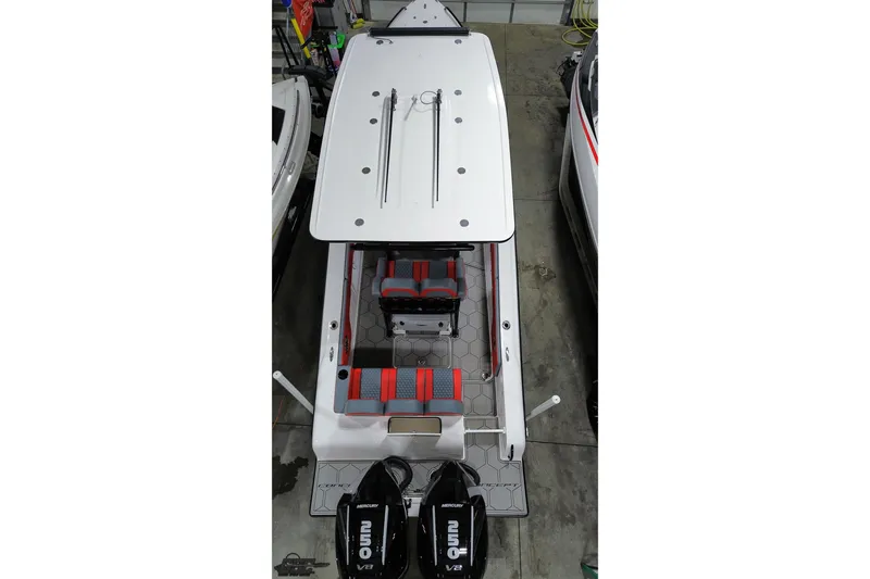 Slide: The Image of Overhead view of 2025 Concept 27' CC boat with dual Mercury engines. - 47